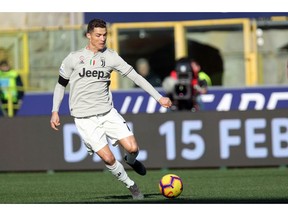 Juventus' Cristiano Ronaldo controls the ball during the Italian Serie A soccer match between Bologna and Juventus FC in Bologna, Italy, Sunday, Feb. 24, 2019.