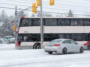 Double decker bus turns onto Montreal Rd from Ogilvie Rd in the east end.