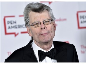 FILE - In this May 22, 2018, file photo, PEN literary service award recipient Stephen King attends the 2018 PEN Literary Gala at the American Museum of Natural History in New York. The master of the American horror novel and his wife Tabitha donated more than $1 million to the New England Historic Genealogical Society based in Boston. The nation's oldest and largest genealogical society announced Tuesday, Feb. 26, 2019, it will use the gift to develop educational programming that introduces family and local history to wider audiences and help the organization expand its headquarters.