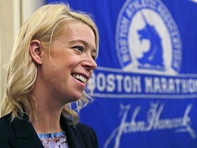 FILE -  In this photo April 14, 2016 file photo, Adrianne Haslet, a 2013 Boston Marathon bombing survivor, speaks at a news conference in Boston. Haslet, who had planned on running this year's race, says she can't physically do it after getting struck by a car last month.