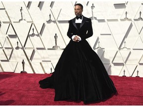 Billy Porter arrives at the Oscars on Sunday, Feb. 24, 2019, at the Dolby Theatre in Los Angeles.