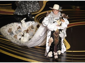 Melissa McCarthy walks on stage to present the award for best costume design at the Oscars on Sunday, Feb. 24, 2019, at the Dolby Theatre in Los Angeles.