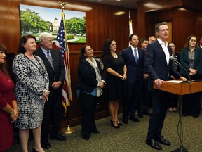 FILE - In this Jan. 31, 2019, file photo, California Gov. Gavin Newsom speaks after meeting with city leaders about an effort to provide relief and humanitarian aid to asylum seekers in San Diego. Newsom is withdrawing several hundred National Guard troops from the nation's southern border and changing their mission.