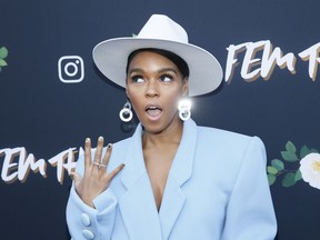 Janelle Monae poses at the "Fem The Future" brunch to celebrate nominated women in music at Ysabel on Friday, Feb. 8, 2019, in West Hollywood, Calif.