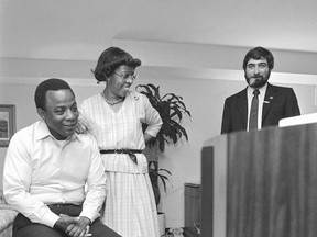 FILE - In this May 17, 1983 file photo, W. Wilson Goode and his wife Velma smile as they react to the news on television of a heavy black voter turn out in west Philadelphia in the Democratic primary election at the Philadelphia Centre Hotel. Pollster Patrick Caddell is on right. Caddell, the pollster who helped propel Jimmy Carter in his longshot bid to win the presidency has died, a colleague said Saturday night, Feb. 16, 2019. He was 68.