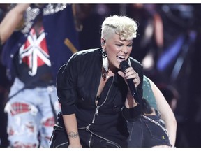 FILE - In this Sept. 22, 2017, file photo, Pink performs at the 2017 iHeartRadio Music Festival Day 1 held at T-Mobile Arena in Las Vegas. The Recording Academy's Task Force on Diversity and Inclusion is a launching a new initiative announced Friday, Feb. 1, 2019, to create and expand more opportunities to female music producers and engineers. More than 200 musicians, labels and others have already pledged, including Pink, Lady Gaga, Justin Bieber, Pearl Jam, Pharrell and Ariana Grande.