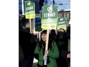 Alexis Ozuna, teacher at Manzanita Community School, marches with other teachers and supporters in Oakland, Calif., Thursday, Feb. 21, 2019. Teachers in Oakland, California, went on strike Thursday in the country's latest walkout by educators over classroom conditions and pay.