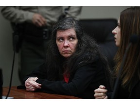 Louise Turpin sits in a courtroom Friday, Feb. 22, 2019, in Riverside, Calif. Turpin and her husband, David, who shackled some of their 13 children to beds and starved them pleaded guilty Friday to torture and other abuse.