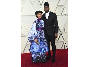 Amatus Sami-Karim, left, and Mahershala Ali arrive at the Oscars on Sunday, Feb. 24, 2019, at the Dolby Theatre in Los Angeles.