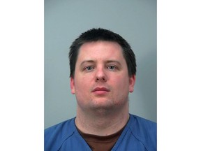 This undated booking photo released by Dane County Jail shows Bryan Rogers. Federal prosecutors say the Wisconsin man struck up an online relationship with a 14-year-old Tennessee girl and offered to help her run away when she told him her adoptive father was sexually molesting her, but only if she sent him video proof of the sexual assault. Prosecutors say Rogers drove to the girl's home to pick her up on Jan. 14 once she provided him with the video. Prosecutors are seeking a grand jury indictment against Rogers. (Dane County Jail via AP)