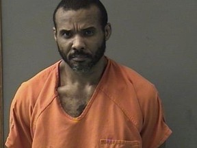 FILE - This undated booking photo released by Bell County Sheriff's Office shows Cedric Marks. The MMA fighter accused of killing two people before escaping from a private prison van says he had "nothing to do with" the bodies found buried in Oklahoma last month. Marks told KPRC2 during a Thursday, Feb. 7, 2019, video call from a Texas jail that he's not guilty of the slayings of Jenna Scott and Michael Swearingin. Marks says that police "coerced" a witness against him and that he "was not trying to escape" when he somehow freed himself Sunday from the van stopped at a McDonald's outside Houston. (Bell County Sheriff's Office via AP, File)