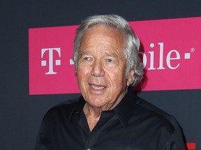 New England Patriots owner Robert Kraft has been charged with two counts of soliciting prostitution at a Florida spa .