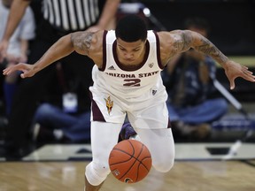 Arizona State guard Rob Edwards looks to recover a loose ball against Colorado in the first half of an NCAA college basketball game Wednesday, Feb. 13, 2019, in Boulder, Colo.