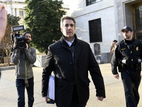 Michael Cohen, President Donald Trump's former personal attorney, leaves Capitol Hill in Washington, Thursday, Feb. 21, 2019. The Senate intelligence committee will interview Cohen behind closed doors on Feb. 26, according to a person familiar with the matter.