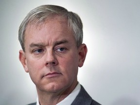 Dennis Oland attends a news briefing by his legal team in Saint John, N.B., on Tuesday, Nov. 20, 2018. A bloodstained jacket, a missing cellphone and a multitude of police errors -- Crown prosecutors are expected to conclude the evidence portion of their case against Dennis Oland at his second degree murder trial in Saint John, N.B., today.THE CANADIAN PRESS/Andrew Vaughan