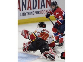 Les Canadiennes de Montreal Ann-Sophie Bettez (24) watches as the puck bounces off the back of Calgary Inferno goalie Delayne Brian (30) to stay out of the net during the third period of Canadian Women's Hockey League final action at the Clarkson Cup, Sunday March 13, 2016, in Ottawa. Ann-Sophie Bettez wasn't getting her hopes up. She'd heard she was back on Hockey Canada's radar for possible selection to national women's team. But at 31, Bettez felt that window had probably closed.