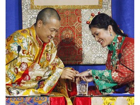 Sakyong Mipham Rinpoche, left, places a ring on his bride Princess Tseyang Palmo's finger during their Tibetan Buddhist royal wedding ceremony in Halifax on Saturday, June 10, 2006.Two claims of sexual misconduct against the Halifax-based spiritual leader of Shambhala International have been found to be credible, a long-awaited independent probe into allegations against Sakyong Mipham Rinpoche has found.
