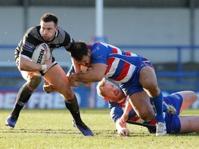 Toronto Wolfpack's Joe Mellor battles against the Rochdale Hornets during Betfred Championship Round 2 rugby action at The Crown Oil Arena in Rochdale, Lancashire, U.K. on Sunday, Feb. 10, 2019 in this handout photo. Joe Mellor's first visit to Toronto was not very special. His Widnes Vikings lost to the Wolfpack and were relegated from the Super League. On Saturday, Mellor will be wearing Toronto colours as the Wolfpack face Widnes in Newcastle in a battle of unbeaten teams in the second-tier Betfred Championship.