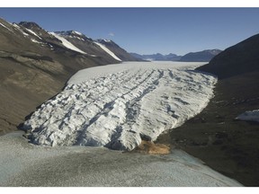 This Nov. 11, 2016 file photo shows the Taylor Glacier near McMurdo Station, Antarctica. Greenland and Antarctica may be a long way away. But new research suggests the accelerating disappearance of their ice caps will have a major and underestimated effect on extreme weather in Canada.