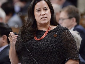 Justice Minister Jody Wilson-Raybould speaks during question period in the House of Commons on Parliament Hill in Ottawa on Thursday, Oct. 18, 2018.