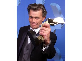 Nicholas Campbell shows off his Gemini award for Best Performance by an Actor in a Continuing Leading Dramatic Role for his performance in "Da Vinci's Inquest," at the 16th annual Gemini awards in Toronto on Monday Oct. 29, 2001. Toronto's The Coal Mine Theatre says the opening of "The Father" will be delayed a week after star Nicholas Campbell was forced to step down due to health concerns.