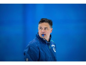 Vancouver Canucks coach Travis Green watches players participate in a drill during NHL hockey training camp in Whistler, B.C., on Friday, September 14, 2018. Heading into the back half of the hockey season, the Canucks know each game will carry a little extra weight.