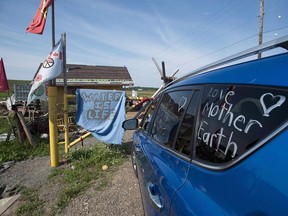 Protesters maintain a Mi'kmaq encampment near the Shubenacadie River, a 72-kilometre tidal river that cuts through the middle of Nova Scotia and flows into the Bay of Fundy, in Fort Ellis, N.S. on Tuesday, July 31, 2018. The company that wants to build natural gas storage caverns north of Halifax has levelled fresh allegations against protesters camped at one Alton Gas site, saying some are armed with knives, "which could be used a weapons."