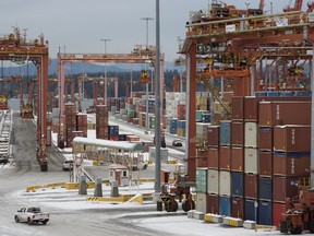 The DP World container terminal is pictured at the Port of Vancouver in Vancouver, Monday, Feb 11, 2019. The Vancouver port saw record cargo numbers in 2018, driven by overseas demand for grain and potash and a thirst for consumer products in Canada.