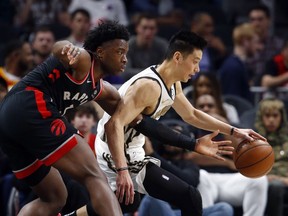 Atlanta Hawks guard Jeremy Lin (7) goes to the basket as Toronto Raptors forward OG Anunoby (3) defends during the first half of an NBA basketball Thursday, Feb. 7, 2019, in Atlanta.