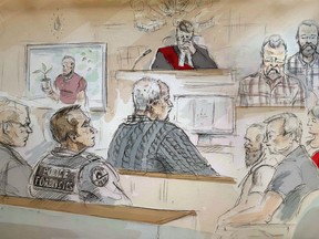 In this artist's sketch, serial killer Bruce McArthur (centre) attends his sentencing hearing in Toronto on Monday, Feb.4, 2019.