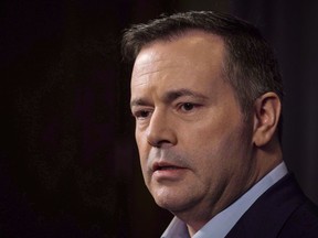 Jason Kenney speaks to the media at his first convention as leader of the United Conservative Party in Red Deer, Alta., Sunday, May 6, 2018. Kenney says if his party wins power they will seriously consider bringing in a changes to reduce the minimum wage for youth and for alcohol servers.