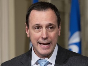 Quebec Education Minister Jean-Francois Roberge responds to reporters questions on religious signs in schools, at a news conference, Tuesday, February 5, 2019 at the legislature in Quebec City.