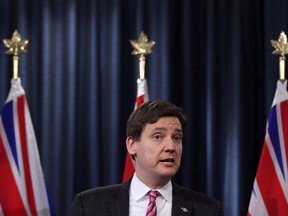 B.C. Attorney General David Eby answers questions from media during a press conference at the Legislature in Victoria, B.C., on Tuesday February 6, 2018.