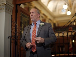 Premier John Horgan says British Columbia boasts Canada's strongest economy but growth is threatened by a shortage of affordable housing for workers and their families. Premier Horgan answers questions from the media during a press conference following the speech from the throne in the legislative assembly in Victoria on Tuesday, Feb. 12, 2019.