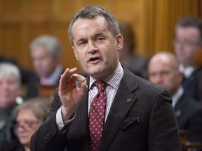 Minister of Veterans Affairs Seamus O'Regan responds to a question during Question Period in the House of Commons Friday November 23, 2018 in Ottawa. The federal government says it will spend $12 million to improve safety at a remote northern Saskatchewan airport near where a plane crashed in December 2017 shortly after takeoff.