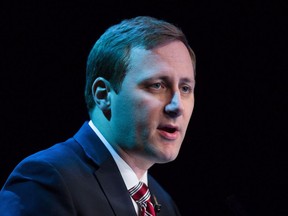 Candidate Brad Trost speaks during a federal Conservative Party leadership debate in Vancouver, B.C., on Sunday February 19, 2017. The federal Conservative party has cleared Trost's leadership campaign over a leak of the party's membership list to the National Firearms' Association ahead of the 2017 leadership vote.THE CANADIAN PRESS/Darryl Dyck