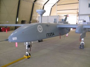 A Heron pilotless spy drone, operated by the Canadian military, sits in a hangar at Kandahar Airfield on July 5, 2010. The Royal Canadian Air Force is hoping to pull the trigger on the purchase of new drones within the next five or six years after spending nearly two decades weighing different options.