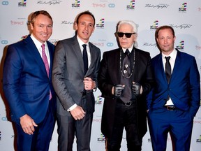 Todd Cowan, left to right, & Jordan Dermer (Co-founders of Capital Developments), Karl Lagerfeld & Peter Freed, taken at the Artshoppe Lofts & Condos launch event in Toronto, April 2015. Several Canadian fashion and design experts who met couture icon Karl Lagerfeld are recalling a powerful visionary whose influence lives on in their work.