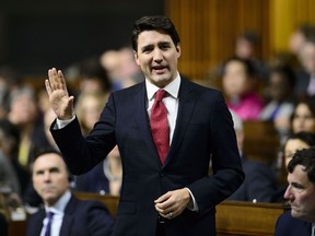 Prime Minister Justin Trudeau stands during question period in the House of Commons in West Block on Parliament Hill in Ottawa on February 5, 2019. The opposition parties are charging back into the House of Commons today, loaded with questions for Prime Minister Justin Trudeau about what his office did to try to help the embattled Montreal engineering company SNC-Lavalin in its corruption case. Before MPs left for a week in their ridings, Jody Wilson-Raybould was veterans affairs minister and Gerald Butts was Trudeau's principal secretary, his closest adviser.