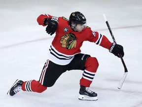 Chicago Blackhawks right wing Patrick Kane celebrates after scoring a goal against the Detroit Red Wings during the third period of an NHL hockey game Sunday, Feb. 10, 2019, in Chicago.