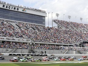 RETRANSMISSION TO CORRECT NAME - Jeffery Earnhardt (18) and Michael Annett (1) lead the field to start the NASCAR Xfinity series auto race at Daytona International Speedway, Saturday, Feb. 16, 2019, in Daytona Beach, Fla.