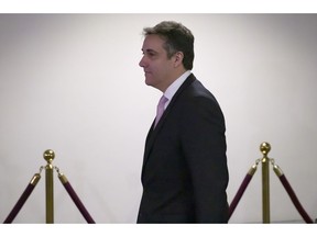Michael Cohen, President Donald Trump's former lawyer, arrives to testify before a closed door hearing of the Senate Intelligence Committee on Capitol Hill, Tuesday, Feb. 26, 2019, in Washington.