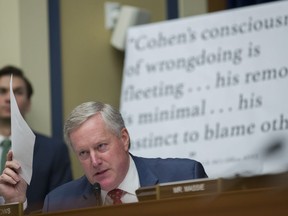 Rep. Mark Meadows, R-N.C. questions Michael Cohen, President Donald Trump's former lawyer, as he testifies before the House Oversight and Reform Committee, on Capitol Hill, Wednesday, Feb. 27, 2019, in Washington.