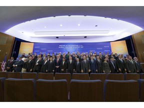 Secretary of State Mike Pompeo, front row center, and other foreign ministers pose for a family photo during the Global Coalition to Defeat ISIS meeting, at the State Department, Wednesday, Feb. 6, 2019, in Washington.