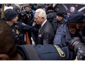 Roger Stone leaves federal court Friday, Feb. 1, 2019, in Washington. Stone appeared for a status conference just three days after he pleaded not guilty to felony charges of witness tampering, obstruction and false statements.