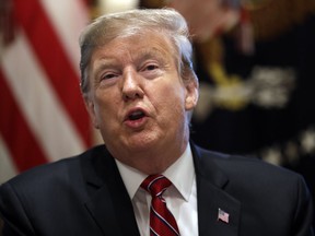 President Donald Trump speaks during a cabinet meeting at the White House, Tuesday, Feb. 12, 2019, in Washington.