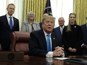 President Donald Trump speaks during a signing ceremony for "Space Policy Directive 4" in the Oval Office of the White House, Tuesday, Feb. 19, 2019, in Washington.