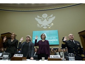 From left, Acting Director at U.S. Government Accountability Office Kathryn Larin, Homeland Security and Justice Director Rebecca Gambler, HHS Assistant Inspector General Ann Maxwell and U.S. Public Health Service Commissioned Corps Commander Jonathan White are sworn in before the House Commerce Oversight and Investigations Subcommittee on Capitol Hill in Washington, Thursday, Feb. 7, 2019.
