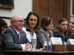 From left, Navy Lt. Cmdr. Blake Dremann, together with other transgender military members, Army Capt. Alivia Stehlik, Army Capt. Jennifer Peace, Army Staff Sgt. Patricia King and Navy Petty Officer Third Class Akira Wyatt, testify about their military service before a House Armed Services Subcommittee on Military Personnel hearing on Capitol Hill in Washington, Wednesday, Feb. 27, 2019, as the Trump administration pushes to ban them.