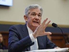 Federal Reserve Board Chair Jerome Powell gestures while speaking before the House Committee on Financial Services hearing on Capitol Hill in Washington, Wednesday, Feb. 27, 2019.